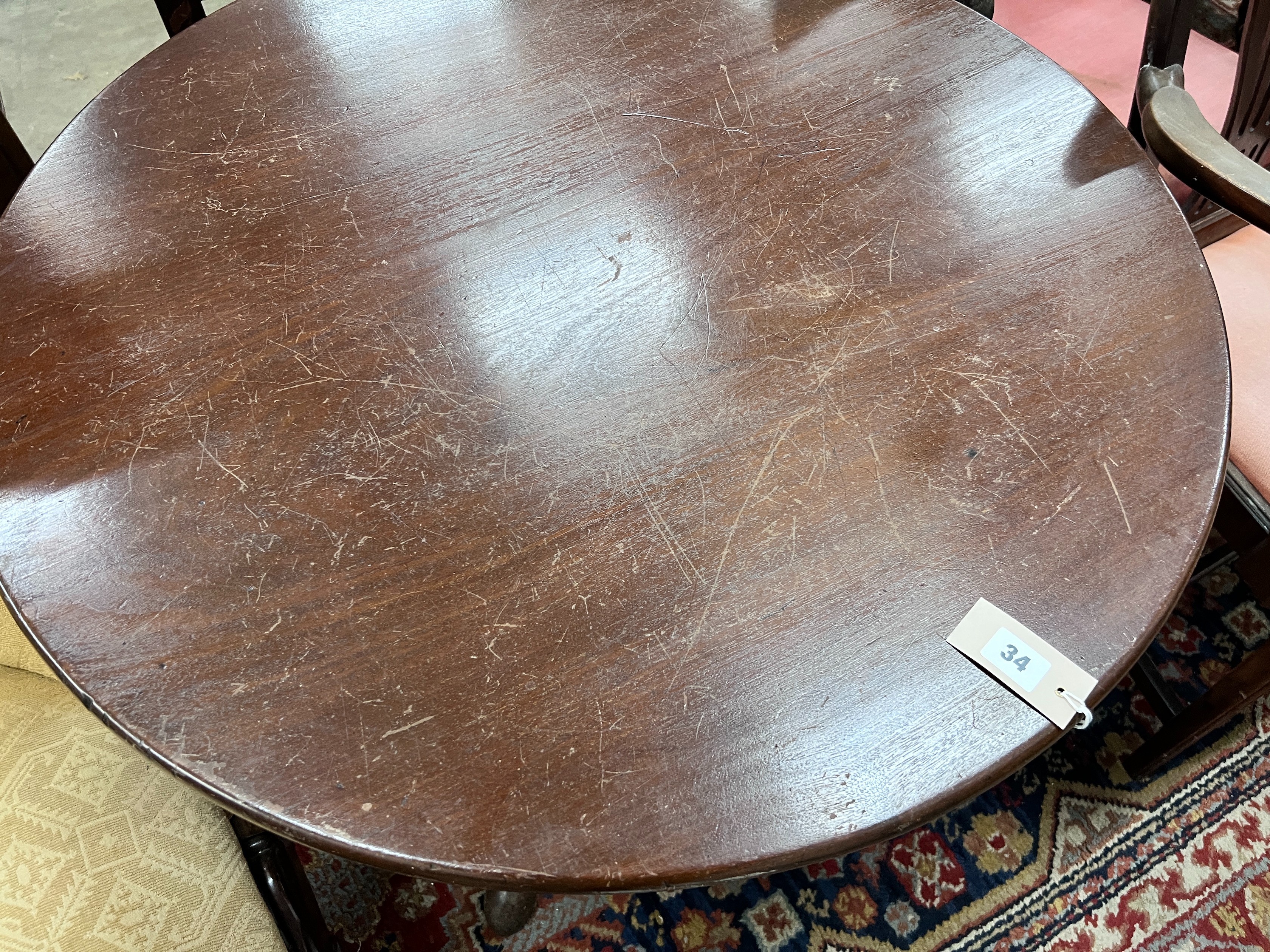 A George III circular mahogany tilt top tripod tea table, diameter 84cm, height 70cm *Please note the sale commences at 9am.